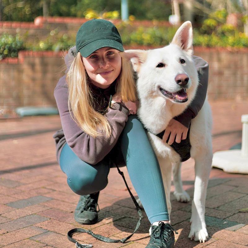 Head trainer Jade with her dog demonstrating gentle, evidence-based training techniques at Stellar Paws Sydney